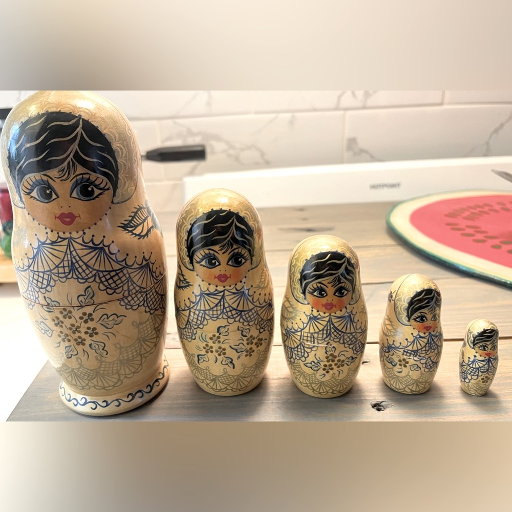 Genuine wooden Russian nesting doll set. 8” to 2”.